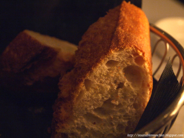 A close-up view of a bowl containing food items, with text visible in the bottom right corner.