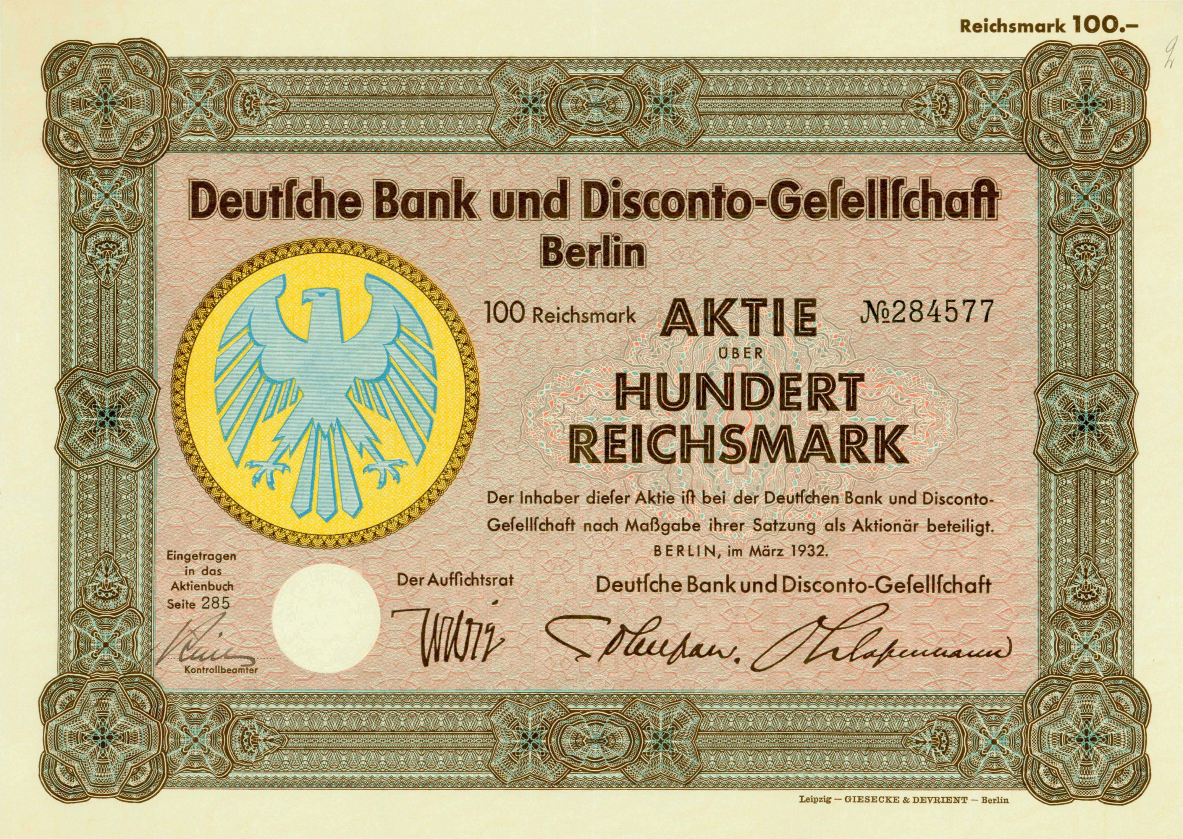 Eine alte deutsche Banknote mit einer Vogeldarstellung und der Aufschrift "Deutsche Bank und Disconto-Gefellichaft Berlin".