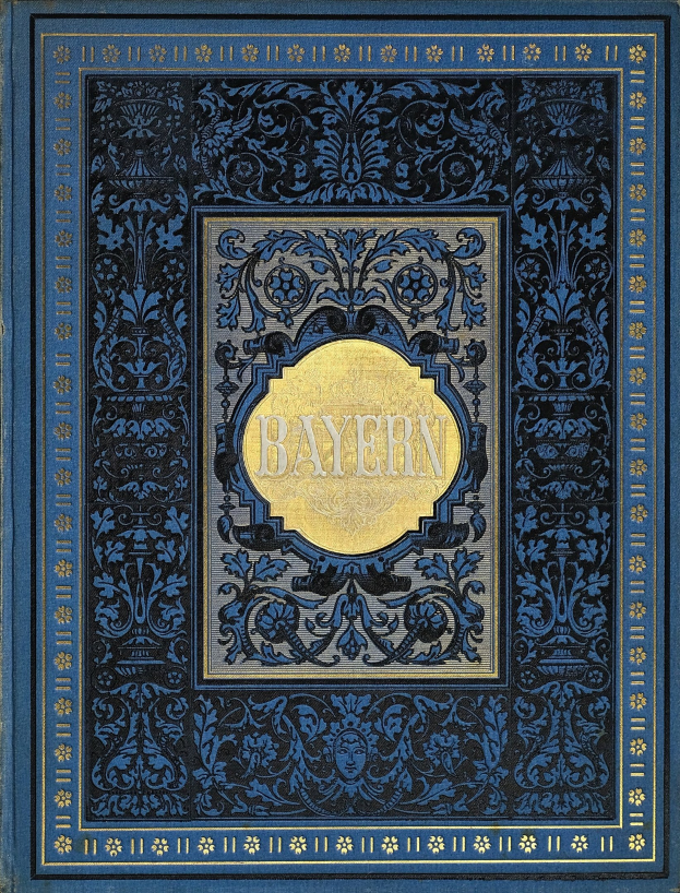 Ein blau-goldenes Buch mit dem Wort "Bayern" auf dem kunstvoll gestalteten Einband.