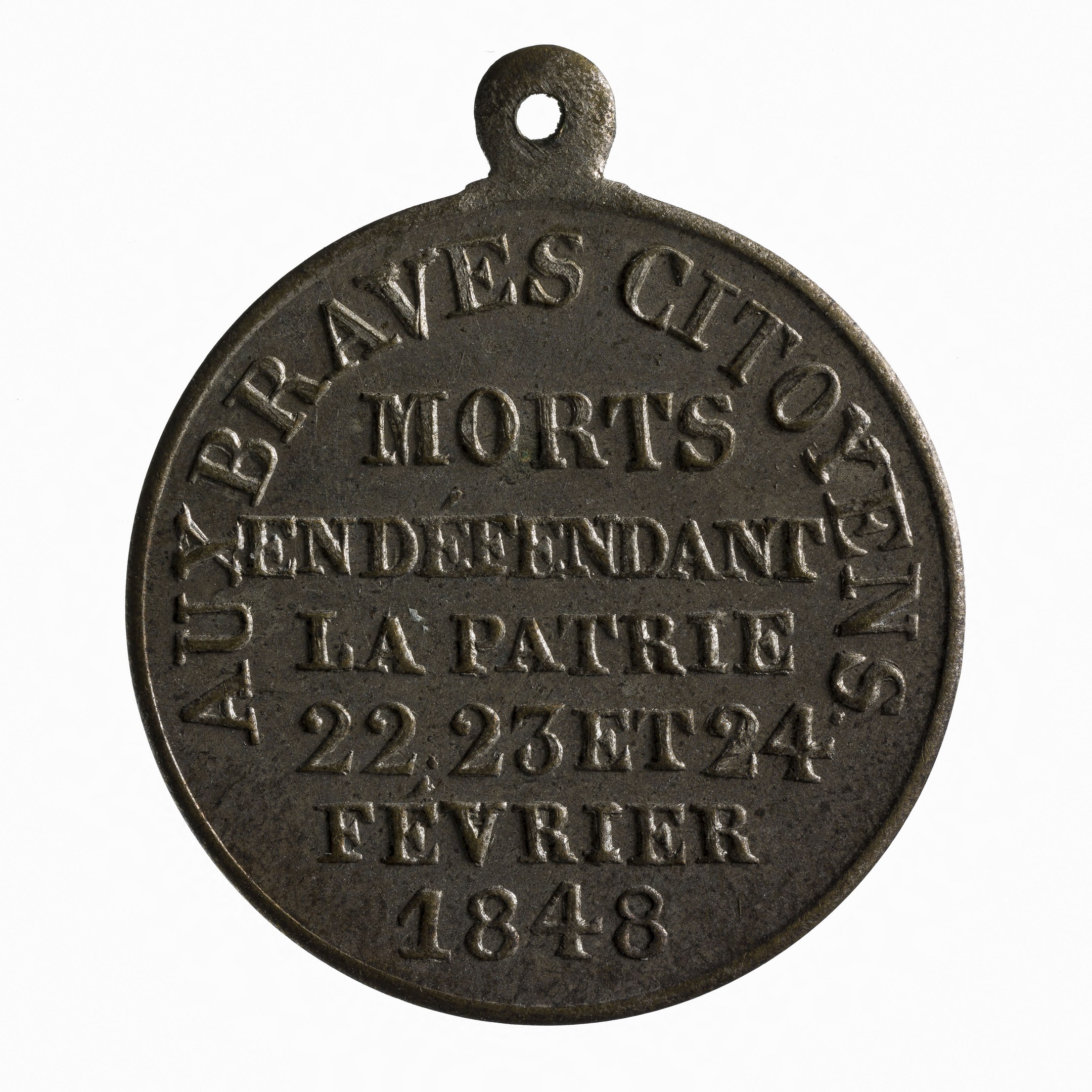 Bronzene Medaille mit 'Braves City Morts' eingraviert auf weißem Hintergrund.