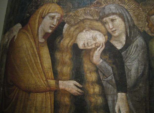 Ein abstraktes Gemälde mit verschiedenen Farben und Formen.