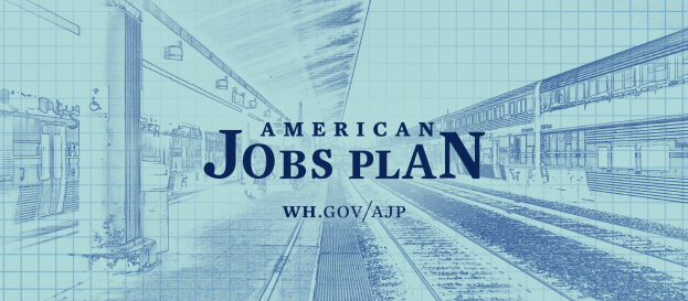 Entwurf einer Bahnhofstation mit der Aufschrift "American Jobs Plan" und einem Zug auf der rechten Seite und Schienen daneben.